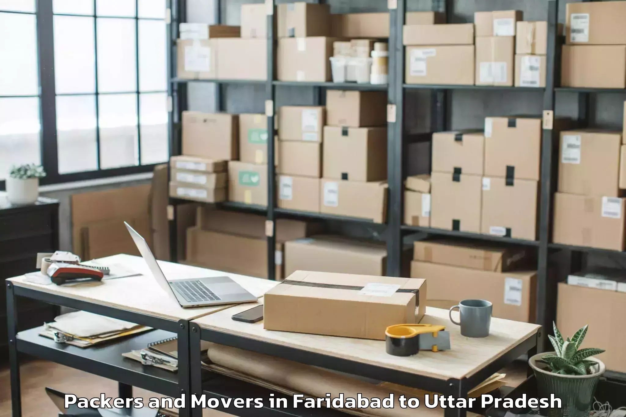 Faridabad to Chillupar Packers And Movers